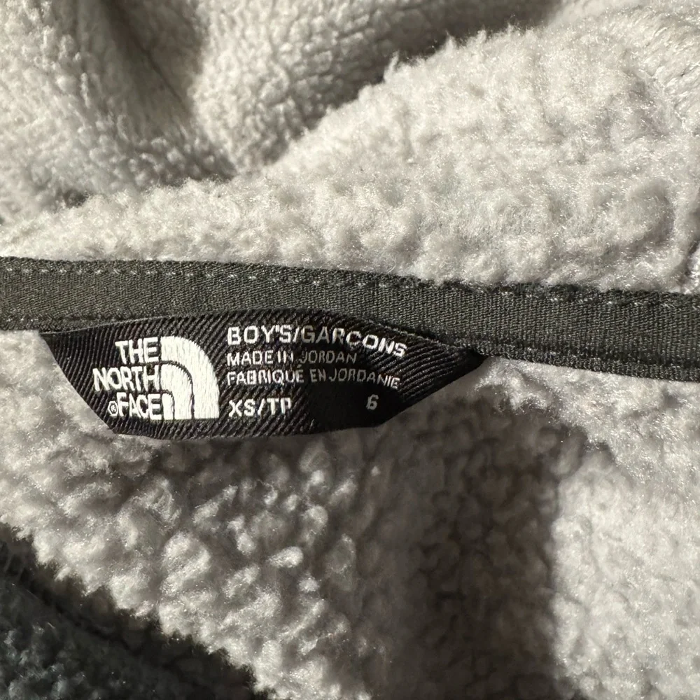 The North Face- Kids hooded fleece. Black and gray camo. Size XS/6